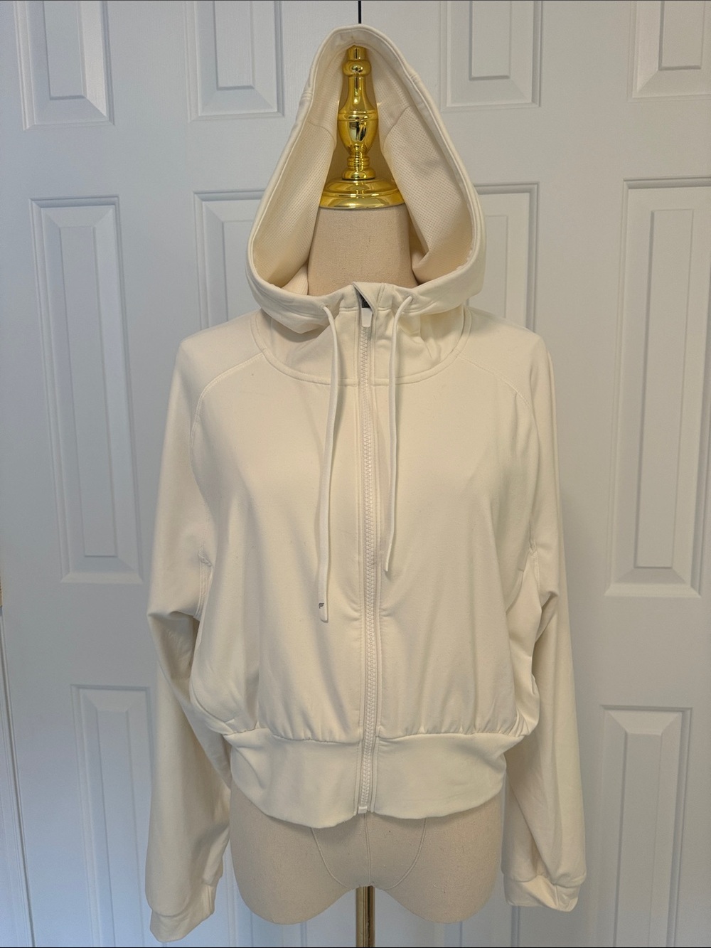 Fabletics Cold Weather Full-Zip Cropped Hoodie in Bone
